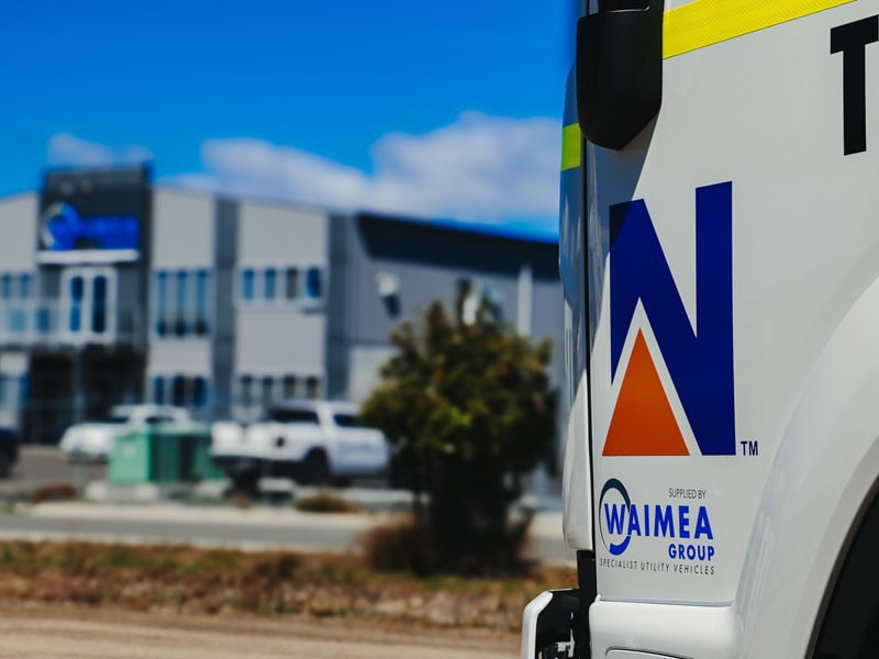 WEL Networks crew working on power lines with their Waimea Built specialist vehicles.