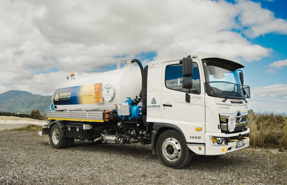 A new Allvac® liquid waste vacuum tanker truck with customer branding being handed over to customers