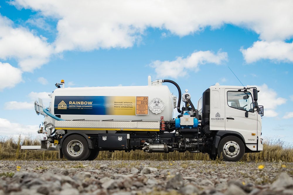 A new Allvac® liquid waste vacuum tanker truck with customer branding being handed over to customers