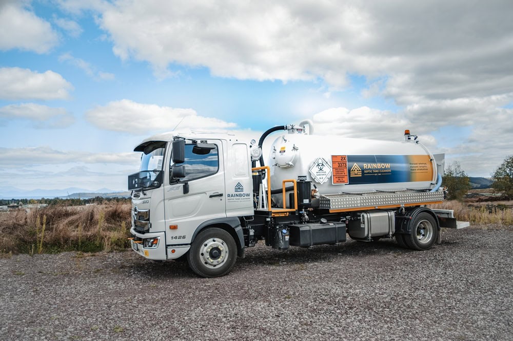 A new Allvac® liquid waste vacuum tanker truck with customer branding being handed over to customers