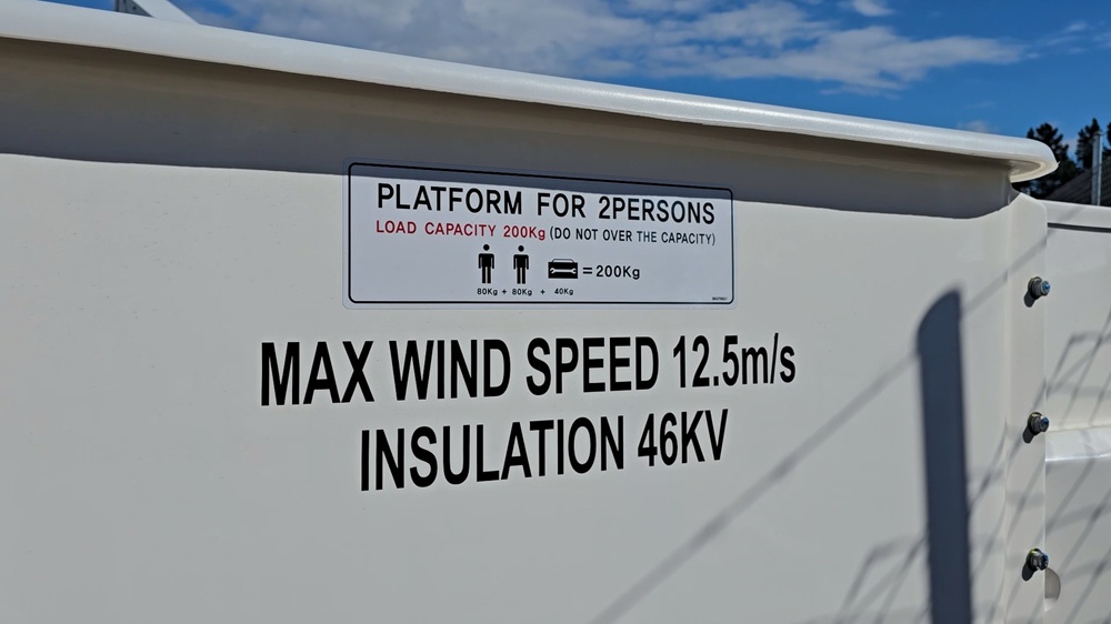 Elevated work platform being used within its certified wind speed rating.