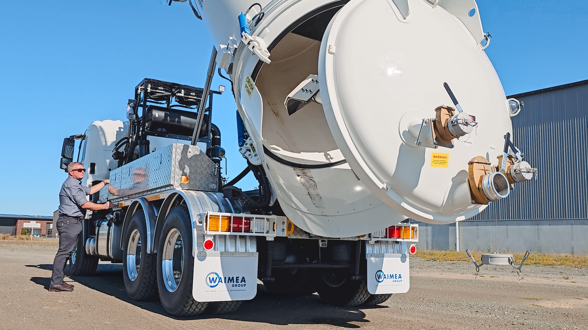 A close-up view of a hydrovac truck’s vacuum system where air is drawn into the tank to pressurise it.