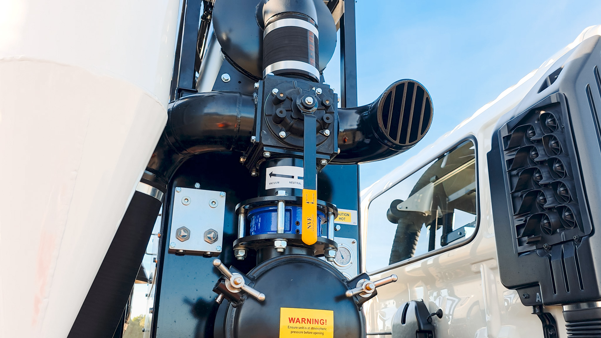 A close-up view of a hydrovac truck’s vacuum system where air is drawn into the tank to pressurise it.