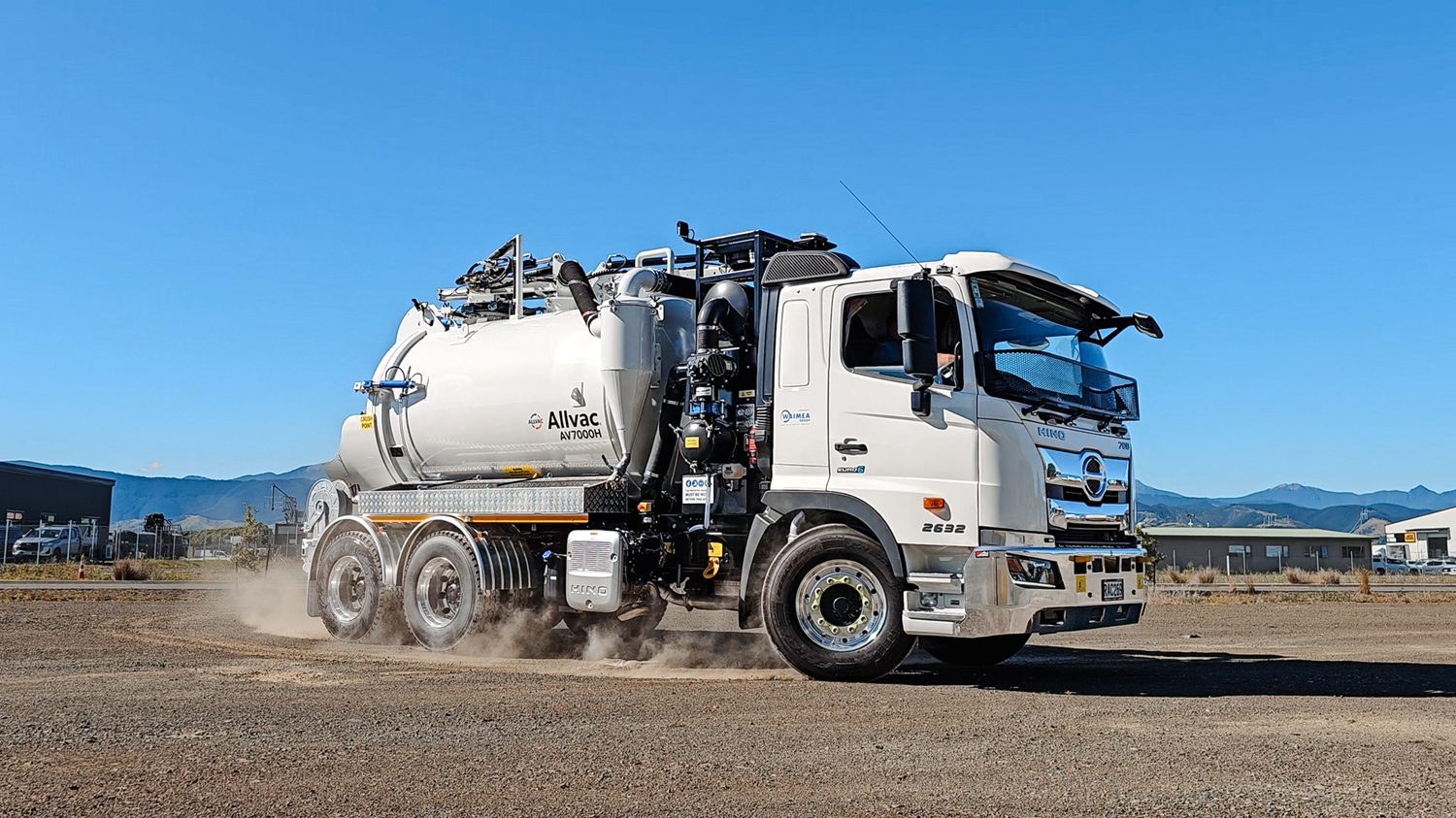 The wheels of a 6x4 Allvac® hydrovac truck parked on a job site, showing the compact wheelbase and manoeuvrable chassis suited to New Zealand hydro excavation work.