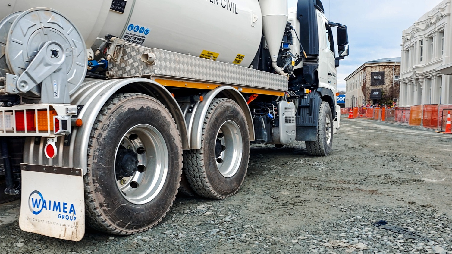 The wheels of a 6x4 Allvac® hydrovac truck parked on a job site, showing the compact wheelbase and manoeuvrable chassis suited to New Zealand hydro excavation work.